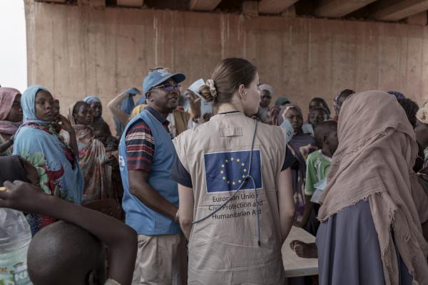 Arriving refugees in an entry centre.